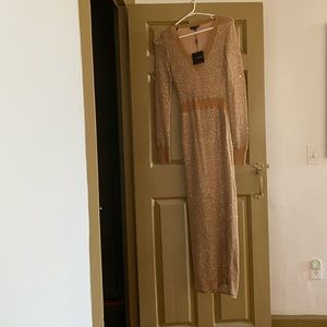 Sequin sweater dress. Sized Medium new with tags.